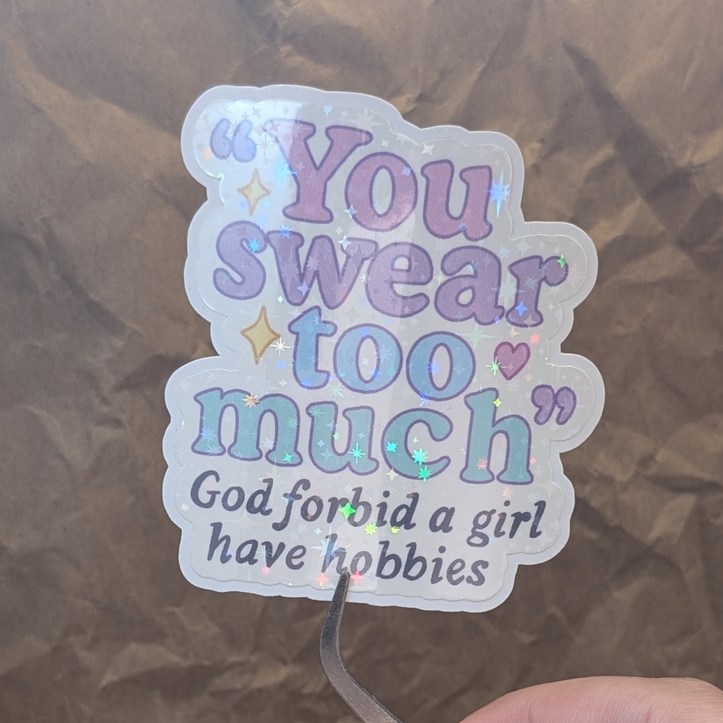 God Forbid a Girl Have Hobbies Sticker – Cute Pastel Text, Waterproof Holographic Sparkle